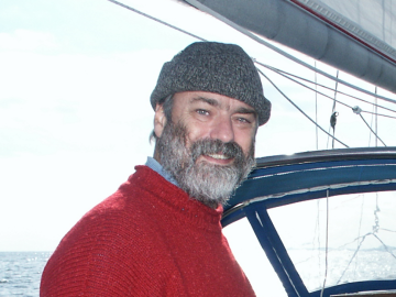 George Dinwiddie on his sailboat